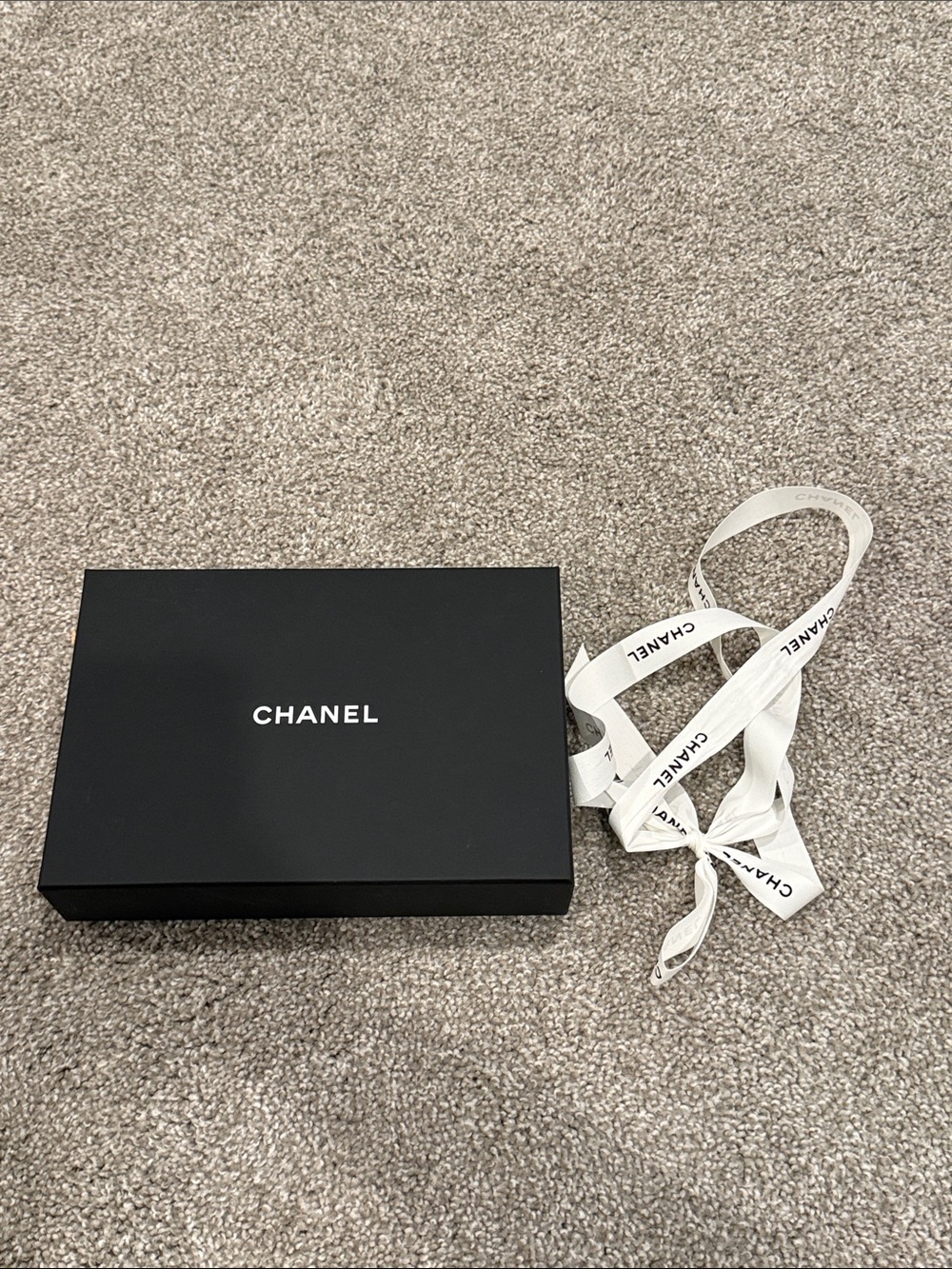 Small Chanel box with ribbon